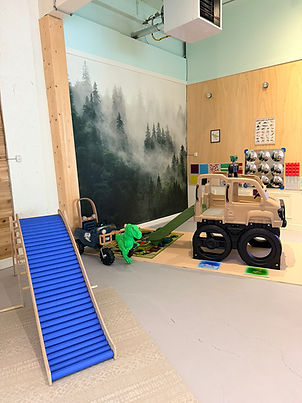 Pretend-play and climbing area at Bananas Kiddo Kingdom.