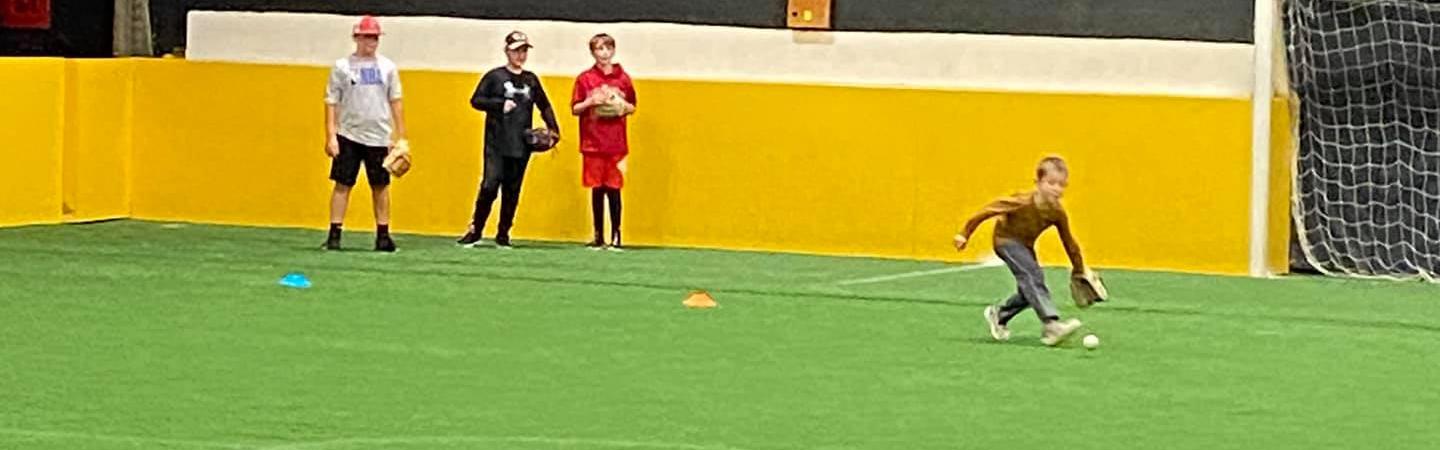 Youth activity taking place on the indoor turf at Bennington Sports Center