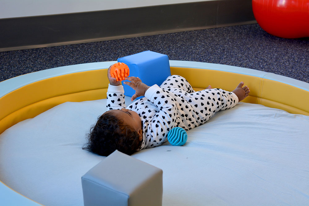 Soft-play and exploration area inside PlaySpace at Boston Children's Museum.