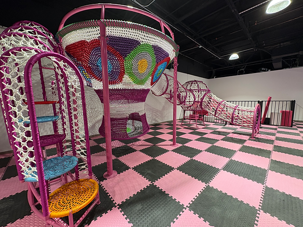 Indoor play area with slides and padded equipment at Bounce N Play Stafford.