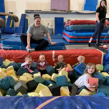 Kids moving through the bounce-and-slide setup at Bounce N Slide.