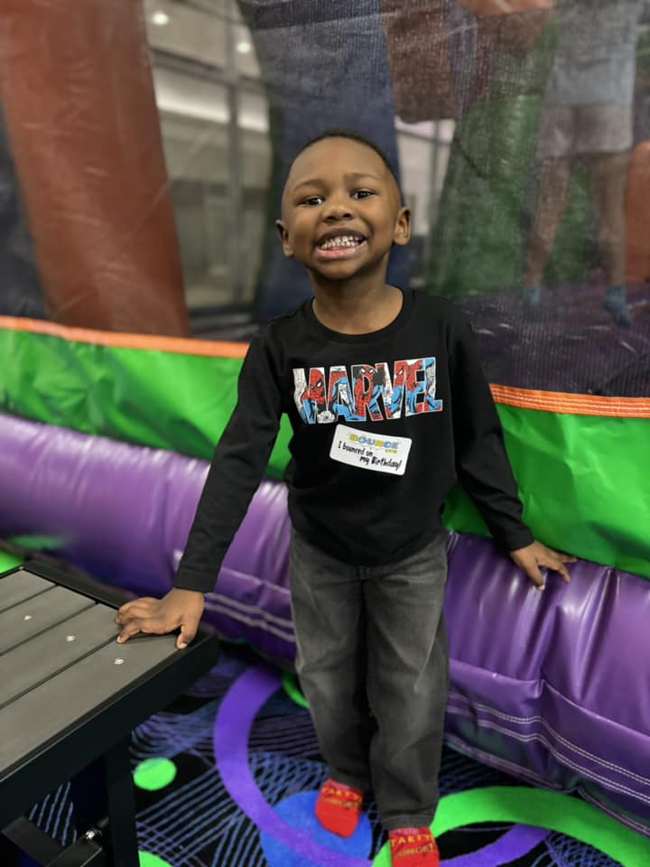 Kids playing in Bounce Roanoke's indoor inflatable space.