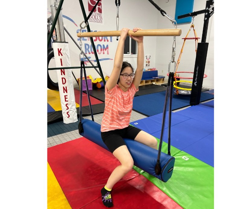 Indoor sensory gym equipment at Bring On The Spectrum
