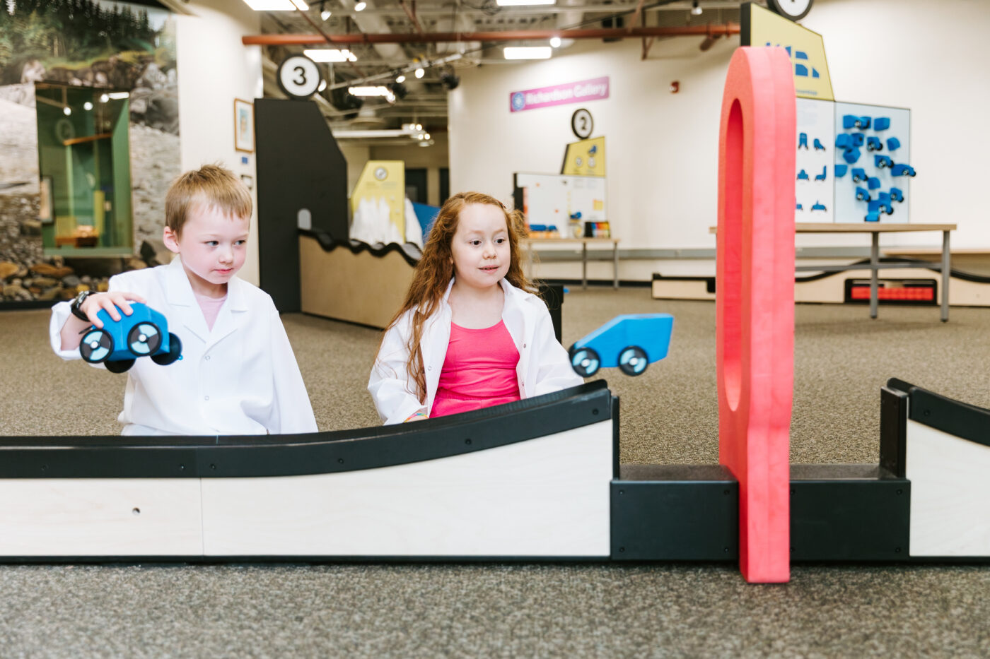 Children exploring a science-focused exhibit at Brooklyn Children's Museum.