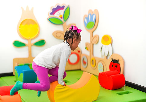 Play features and seating inside Bunnie Bounce Grove