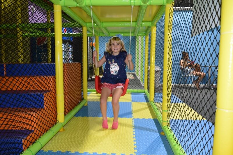 Indoor swing feature at Cabin Fever Play Centre