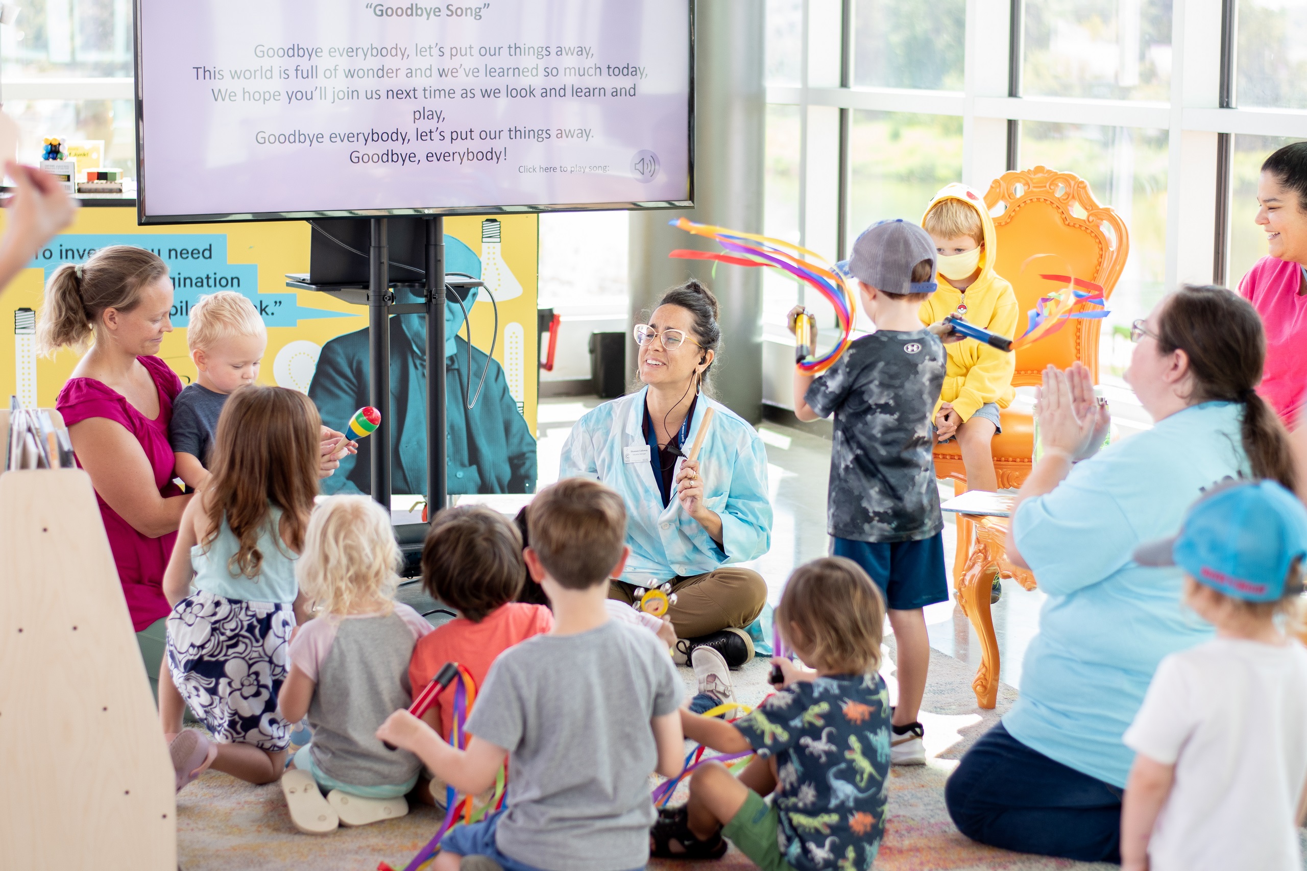 Children exploring a hands-on activity area at the Cade Museum.