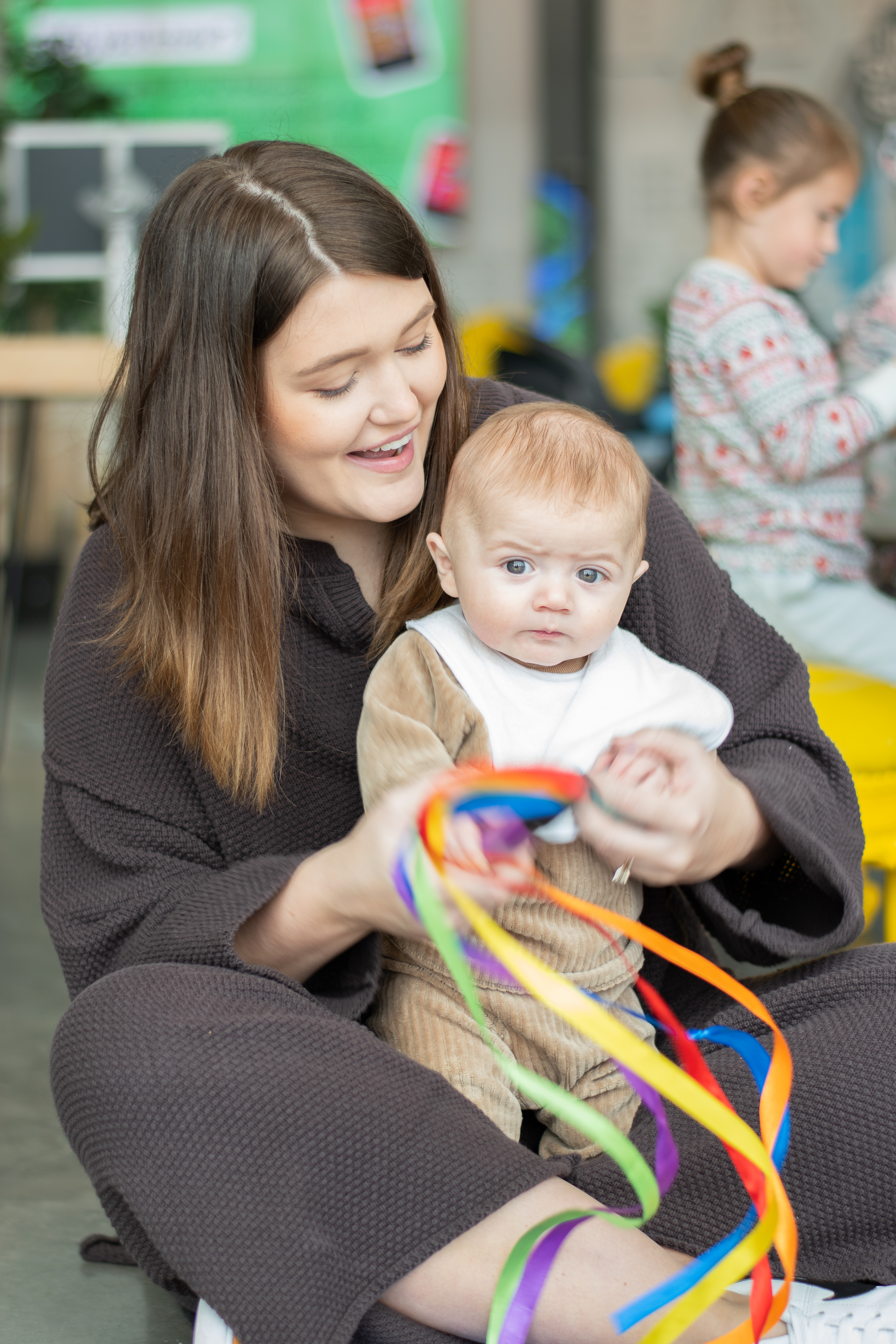 Visitors interacting with exhibits inside the Cade Museum