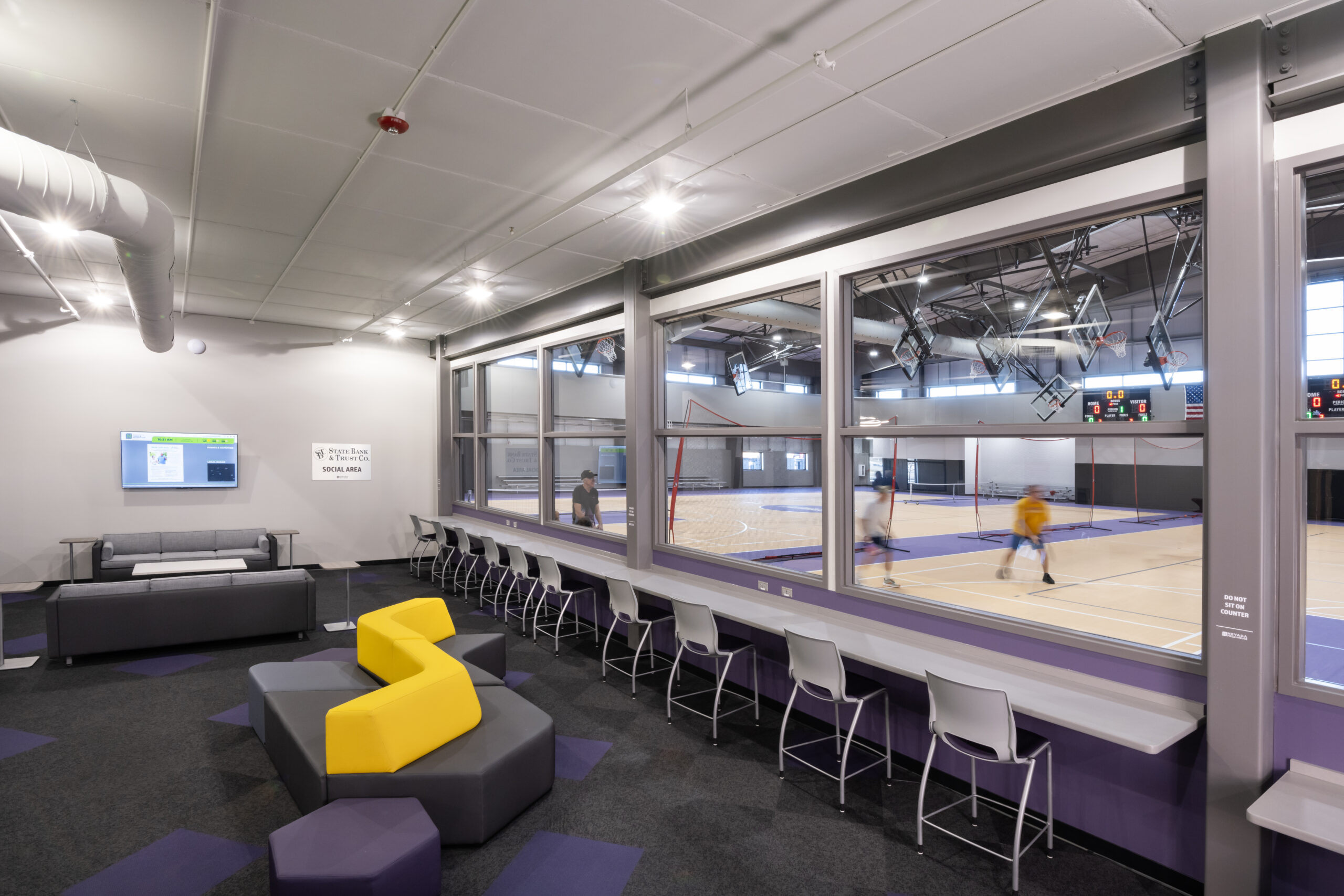 Indoor playground at the Nevada Field House with courts visible nearby.