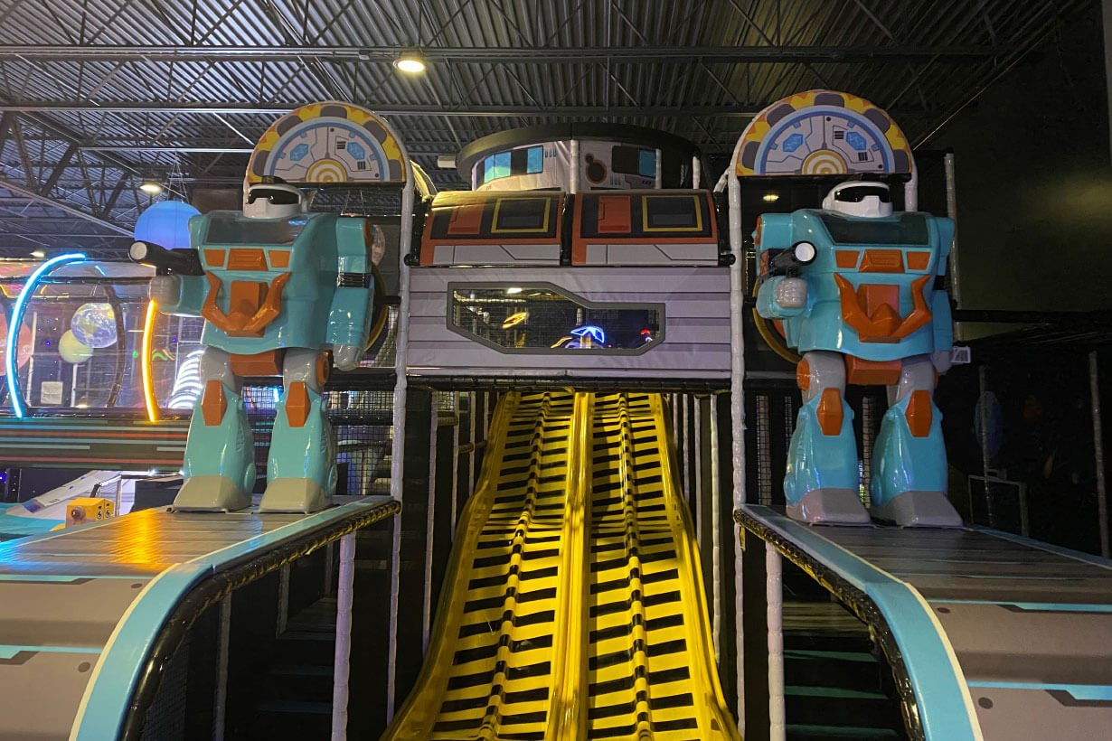Colorful climbing and play structure at Catch Air Dacula.
