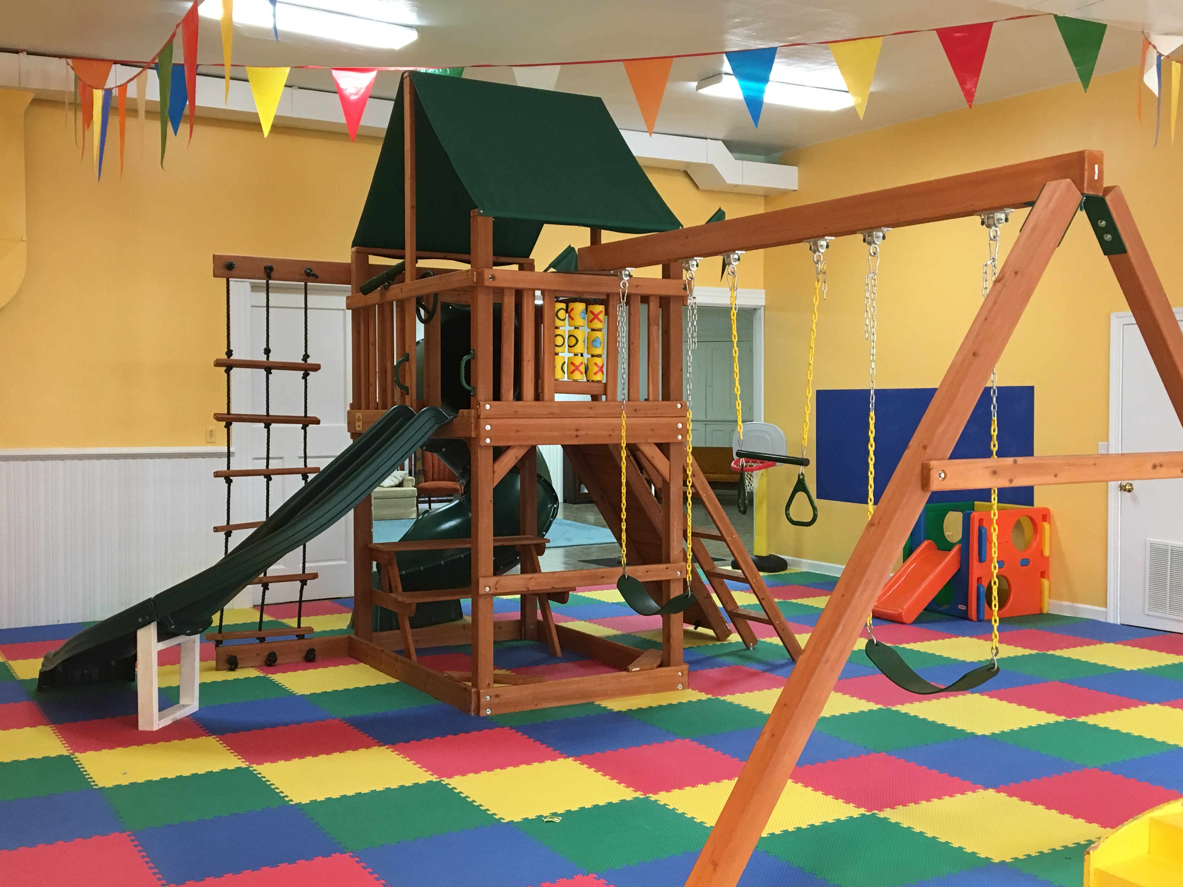 Play equipment inside the children's indoor playground at Central United Methodist Church.