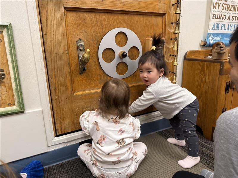Toddlers playing inside Chicago Children's Museum.