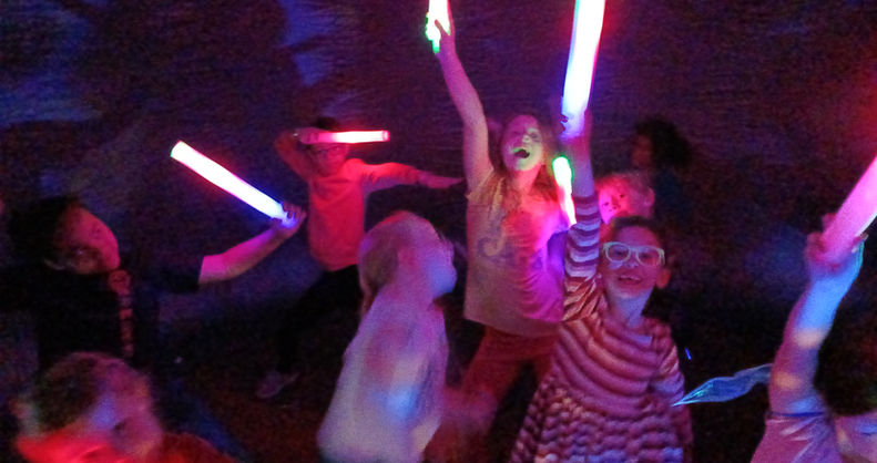 Children at a birthday party add-on in the museum's gathering hall.