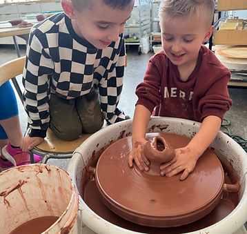 Children using the clay studio at The Children's Museum of Southern Oregon.