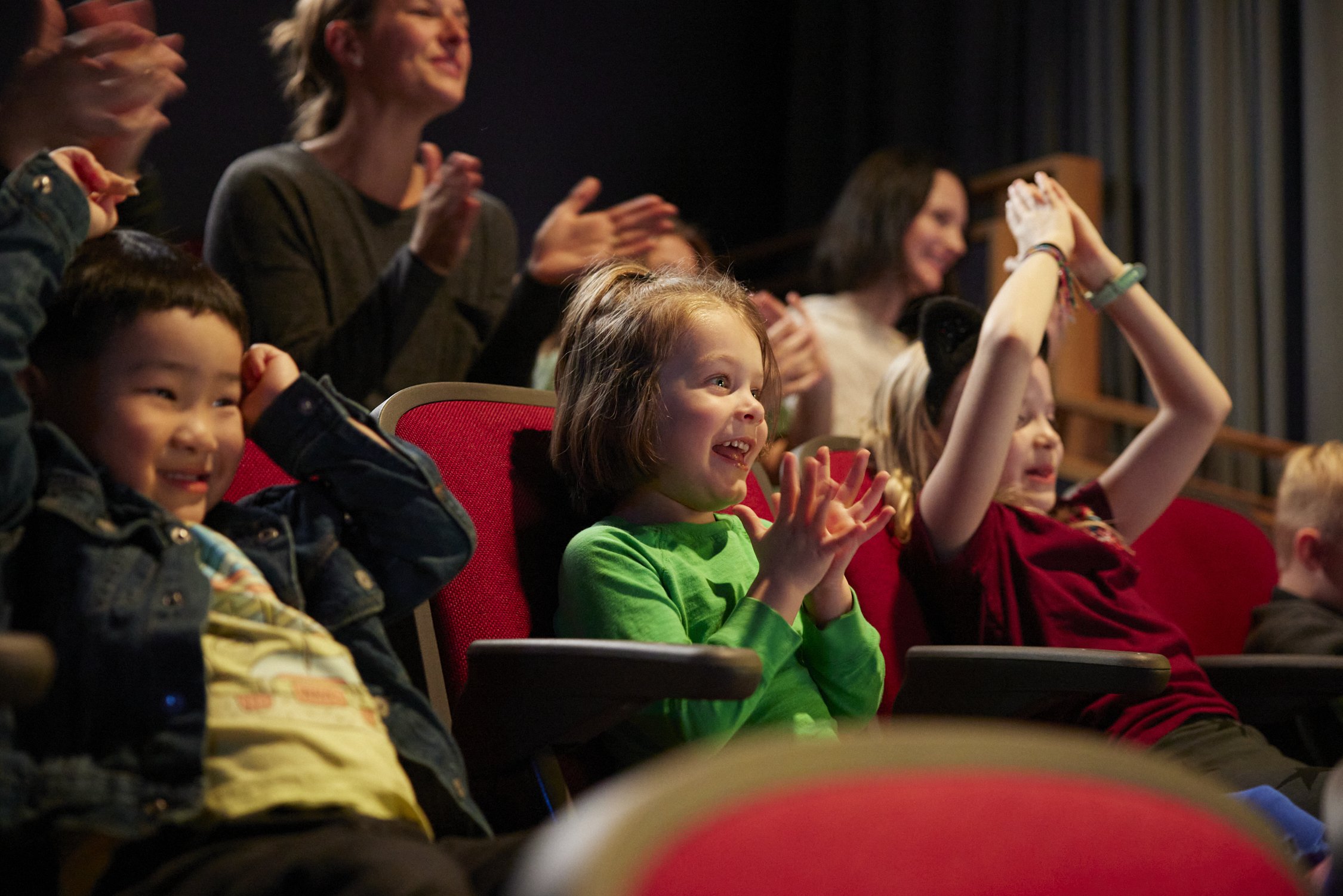 Children enjoying a performance at CMTM theatre.