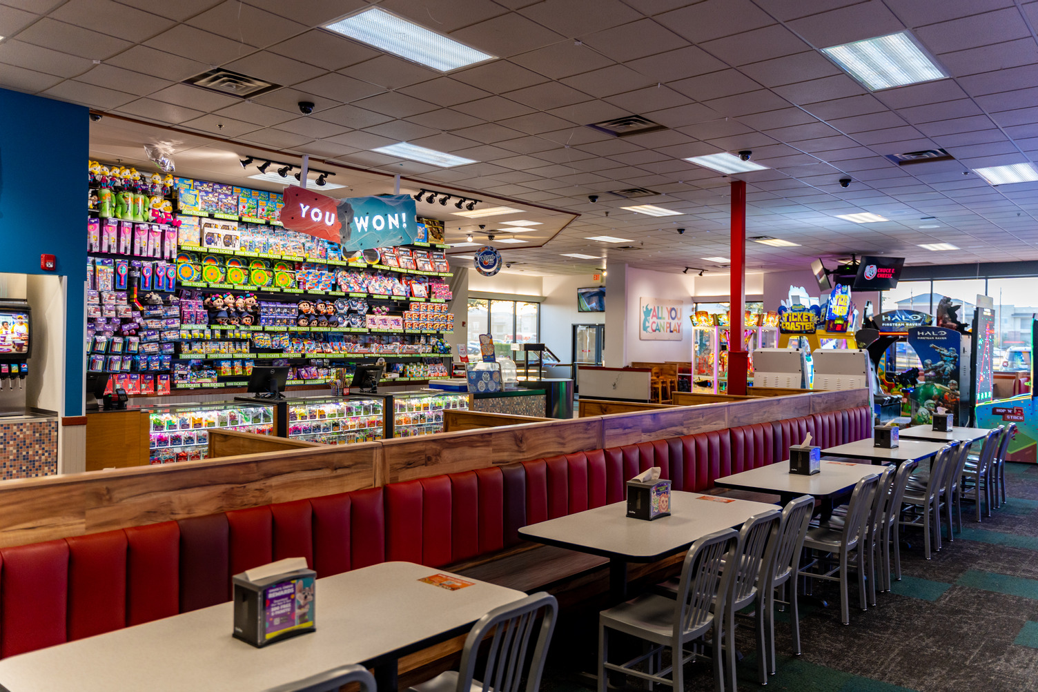 Interior arcade and kid activity space at Chuck E. Cheese.