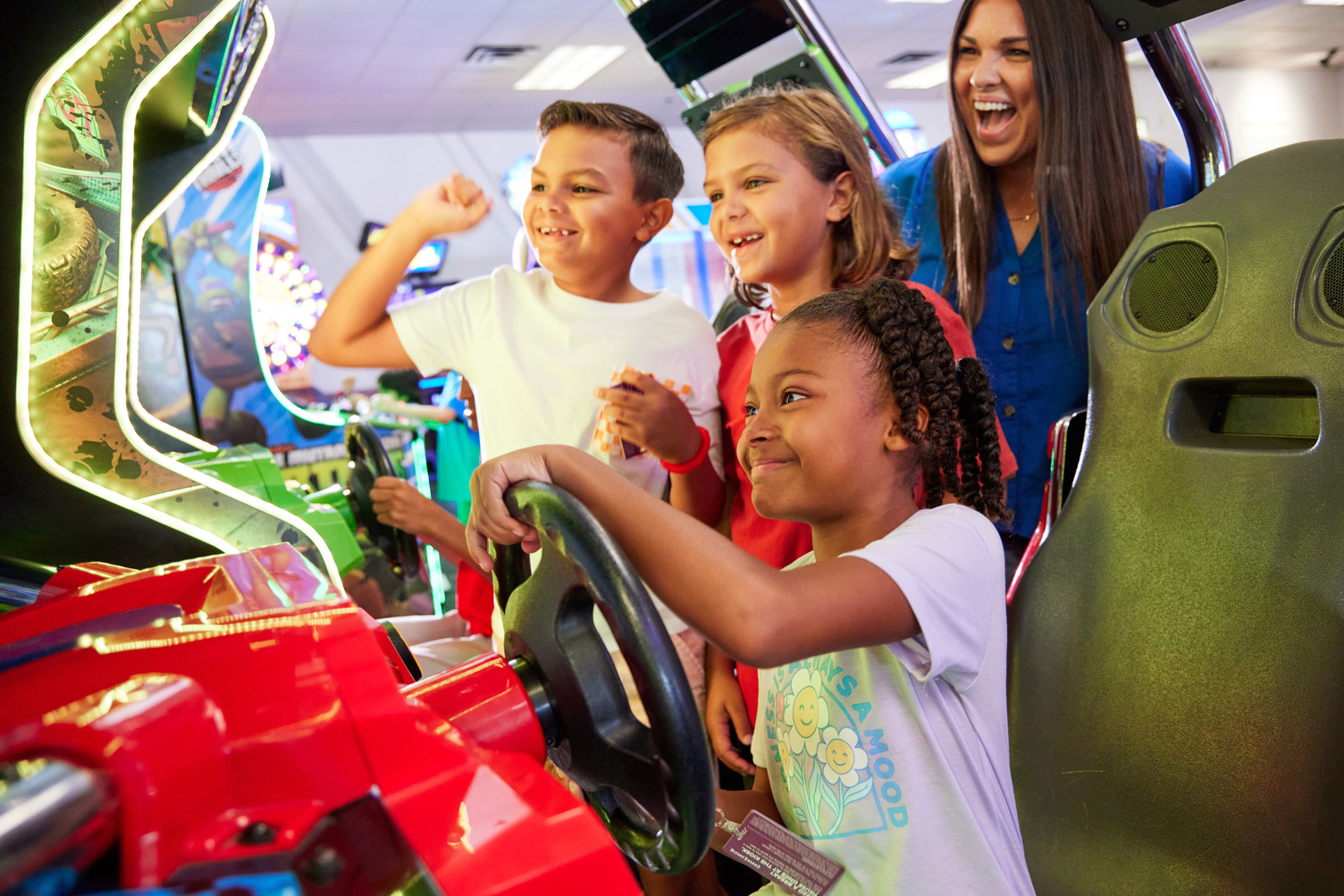 Arcade games and family play area at Chuck E. Cheese.