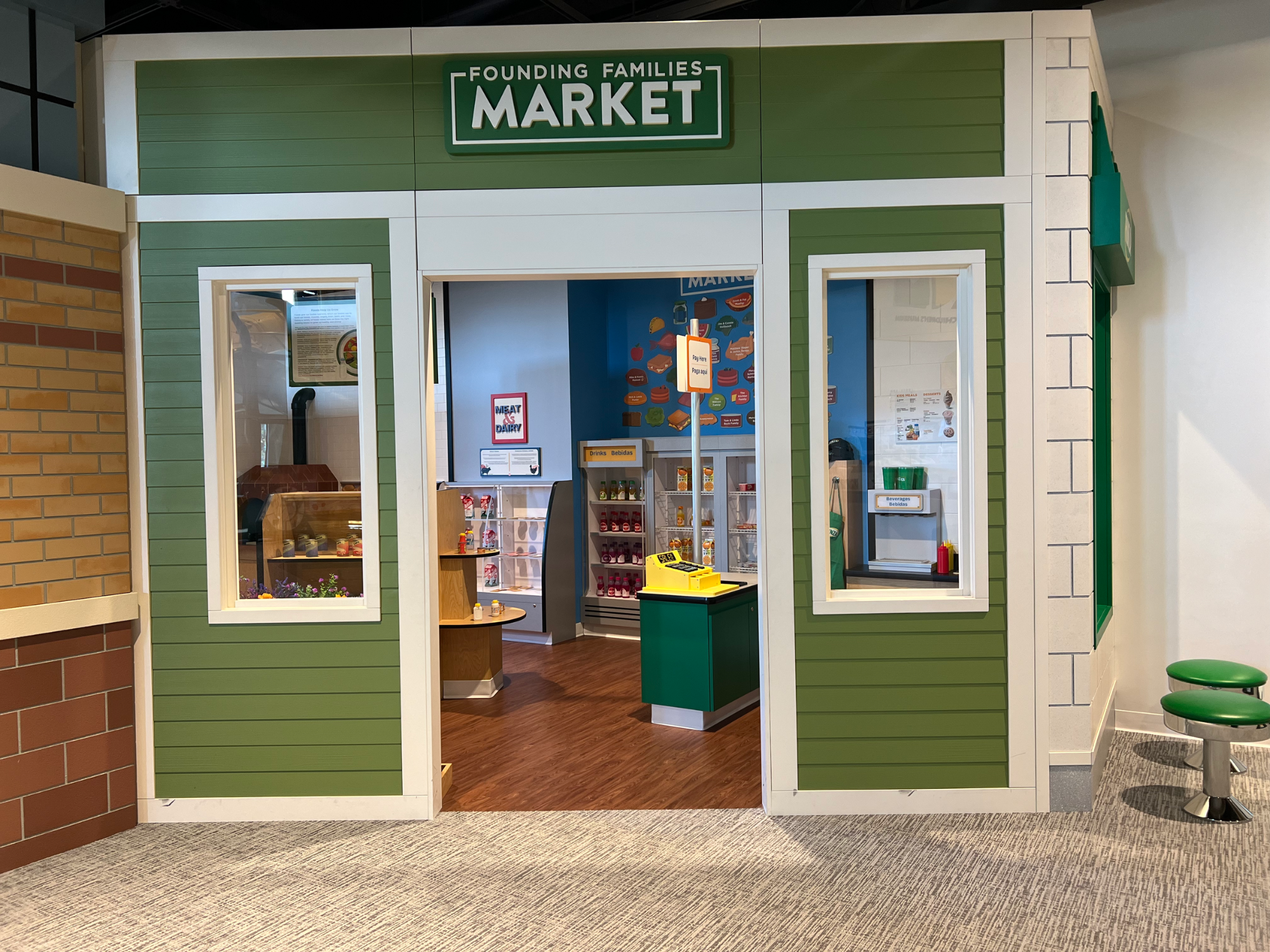 Kid-sized market exhibit inside Columbus Area Children's Museum.