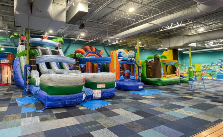 Wide view of inflatables inside Cowabunga's North Reading