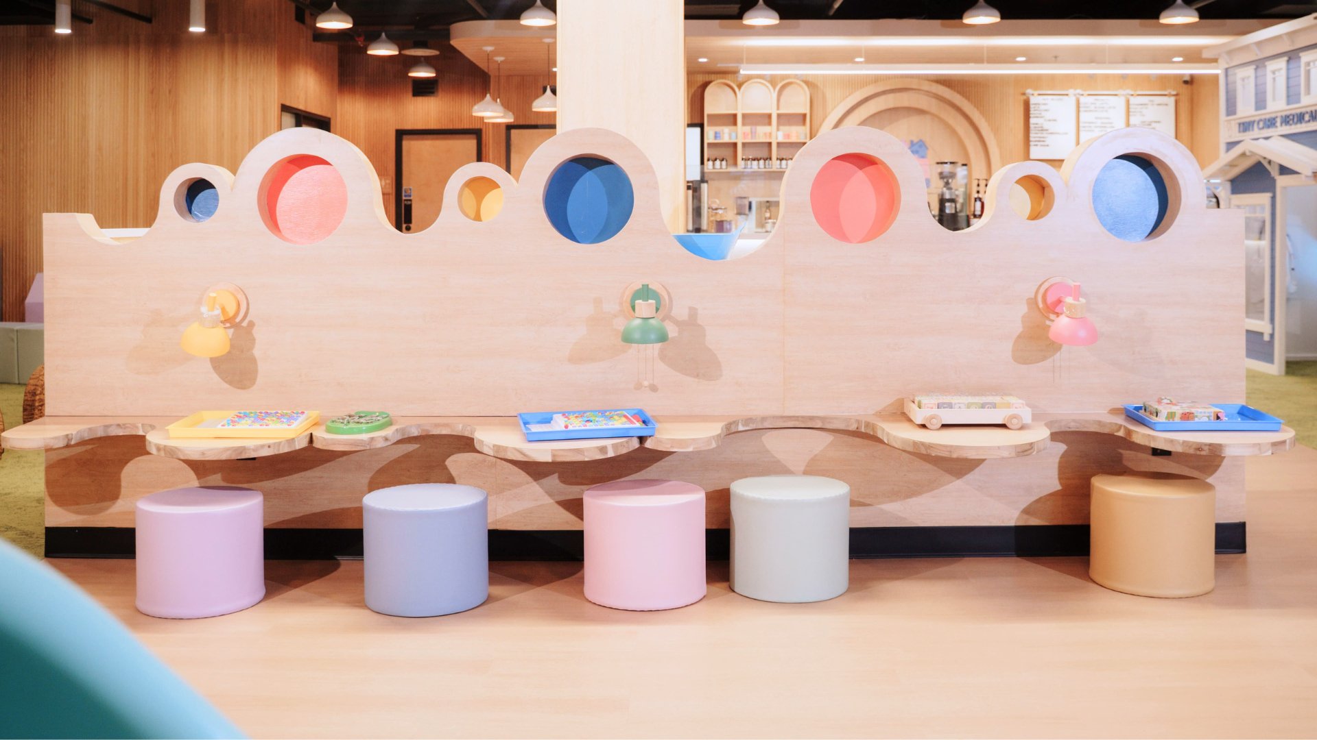 Pretend-play stations at Cozy Village Play Cafe