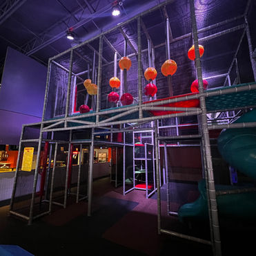 Additional view of the soft-play and slide area at Crazy Pinz.