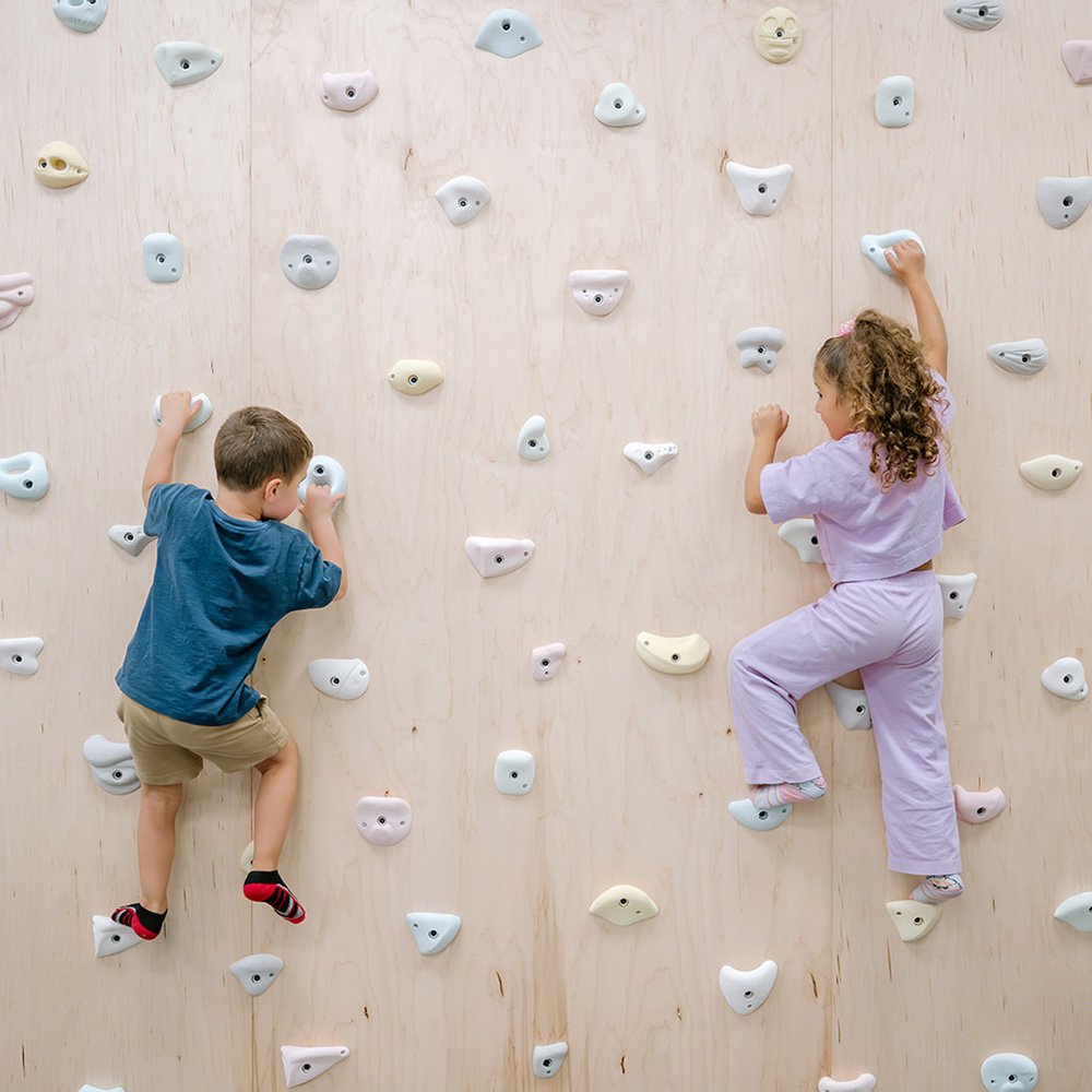 Children climbing at Creating Connections Open Play Gym.