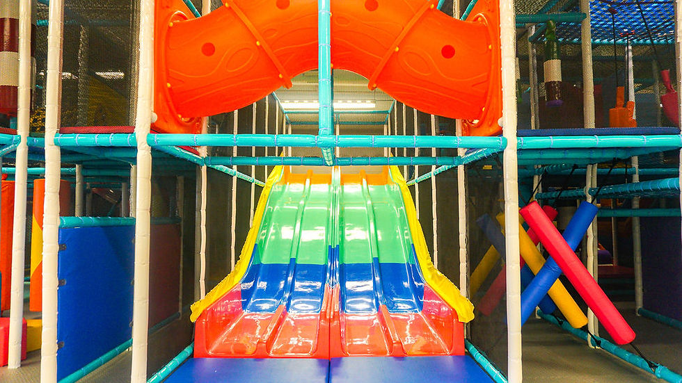Large indoor play structure at Dig 'N Play