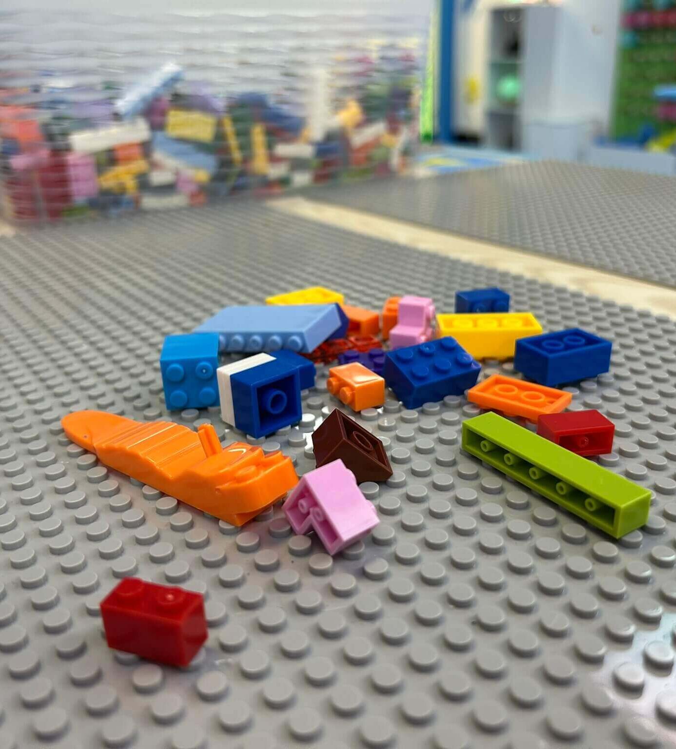 Building and tabletop play area at Discovery Den.