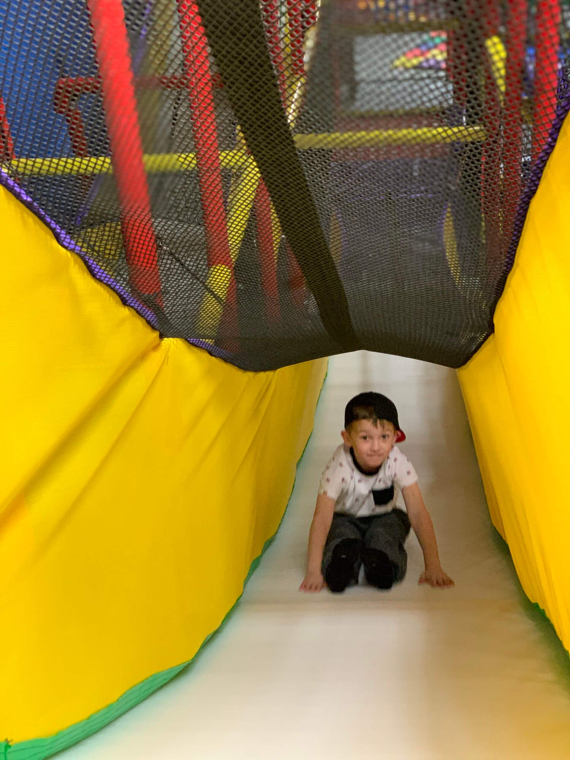 Multi-level indoor play structure at Discovery Zone Florence Mall.