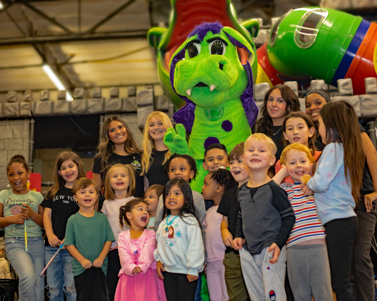 Families using the main play floor at Dizzy Castle in Vancouver.