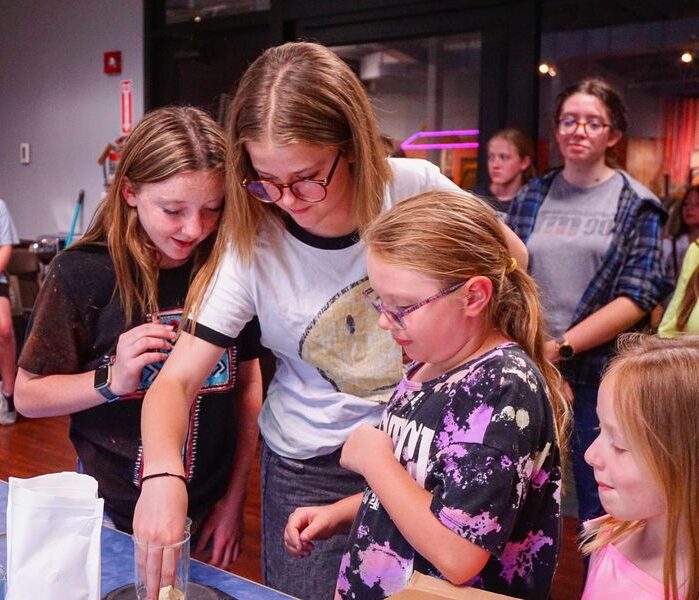Children participating in a hands-on activity at Don Harrington Discovery Center.