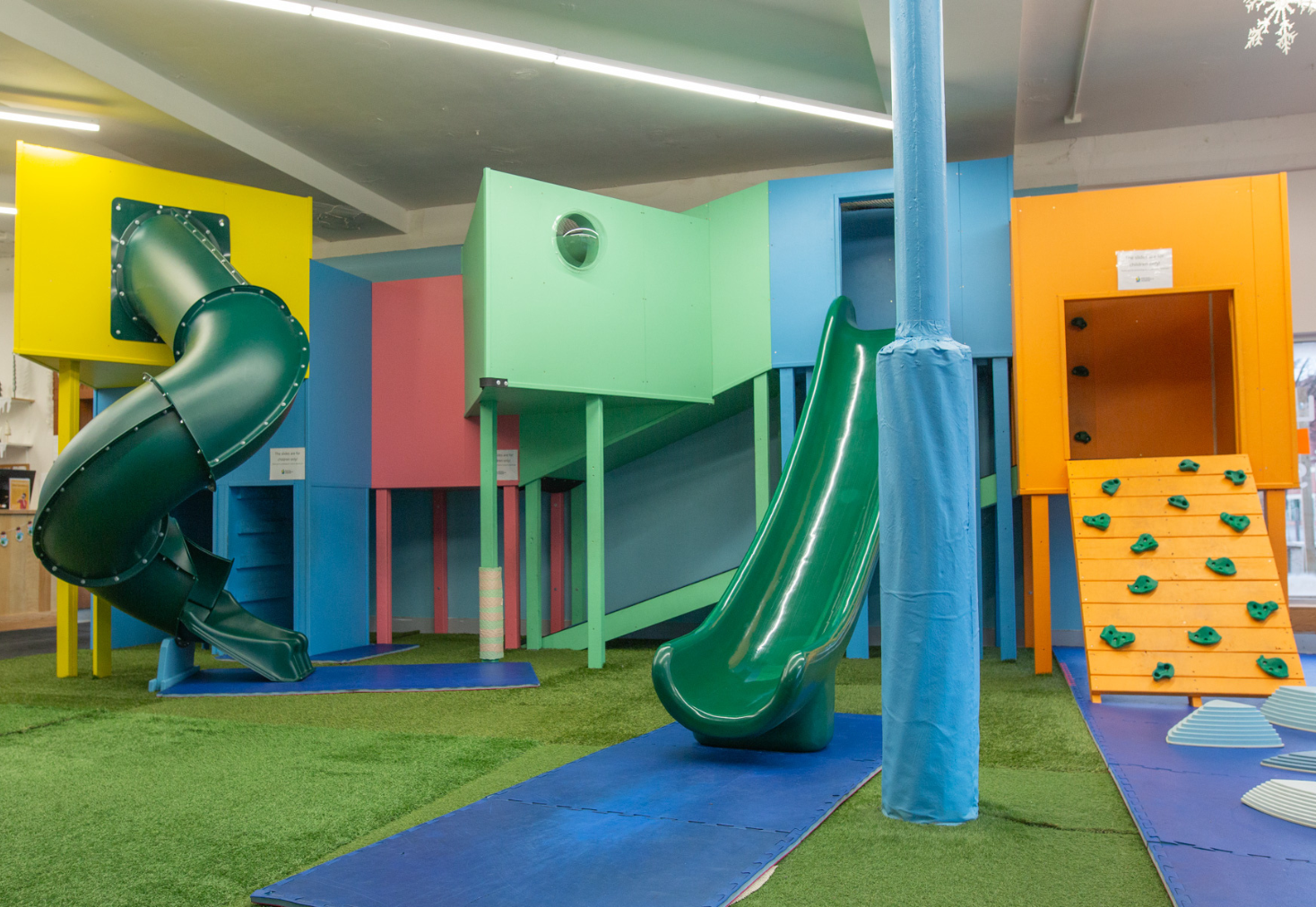 Colorful climbing structure inside the museum's Adventure Climber exhibit