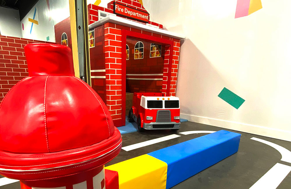 Pretend-play Kids Town area at Exhilarate Savannah