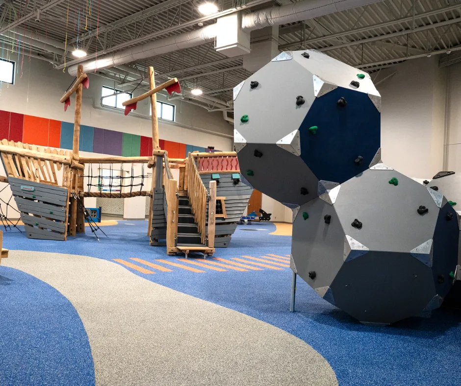 Climbing boulders and pirate-ship structure at Explorer's Cove.