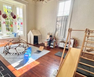 Small wooden indoor climber at Family Social Club