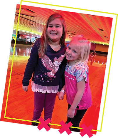 Children roller skating on the rink at Firehouse Skate 'N Play.