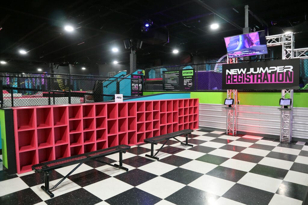 Cubby storage and check-in area inside Flying Squirrel Moscow.