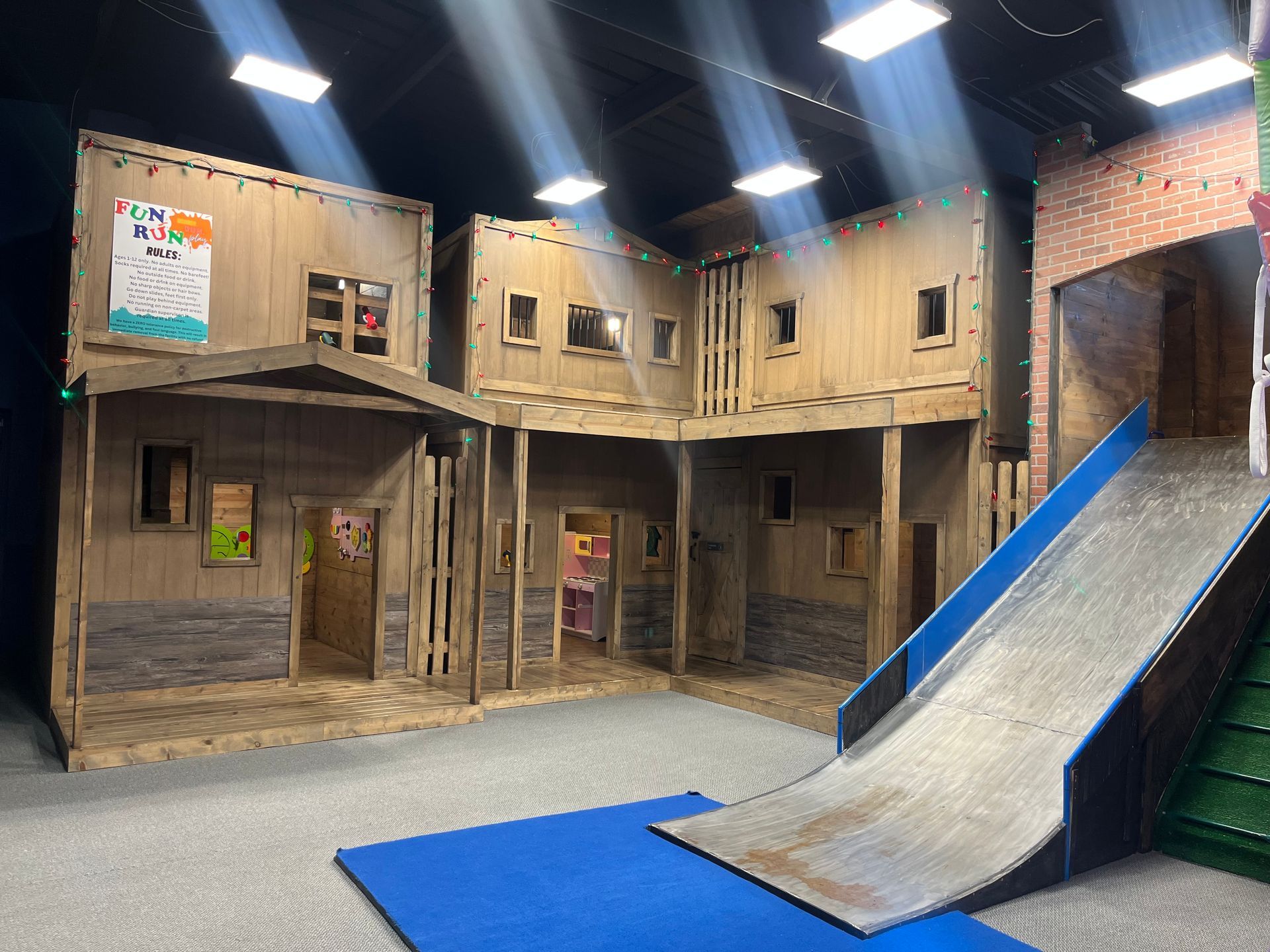 Wooden town play area at Fun Run Blue Springs