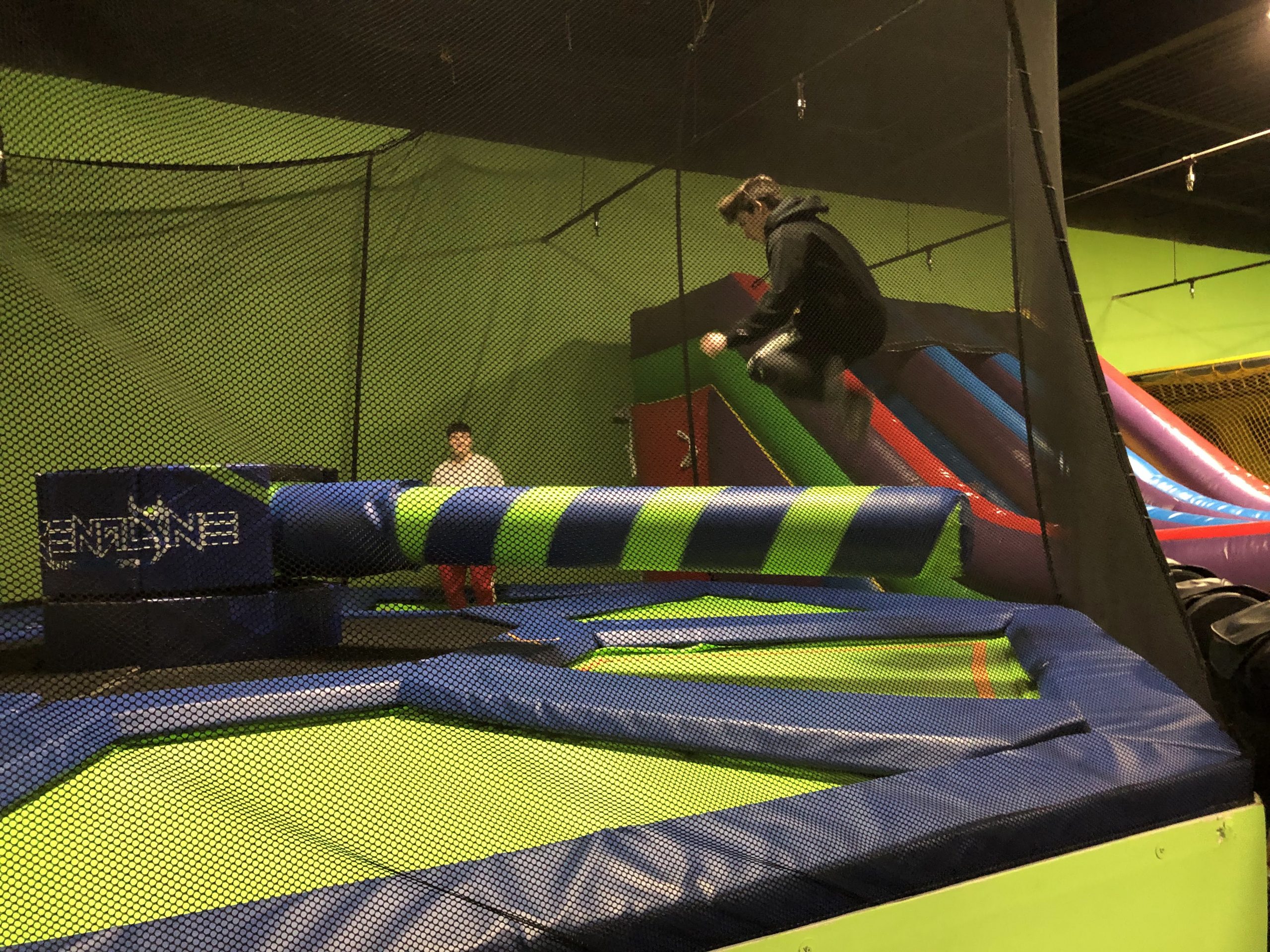 Children playing in the trampoline and inflatable area at FunTime Inflatables