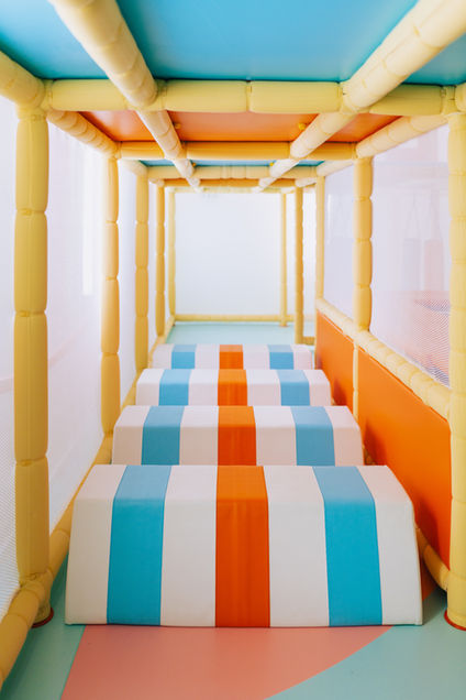 Family seating and play environment at Funzy Play Tangram