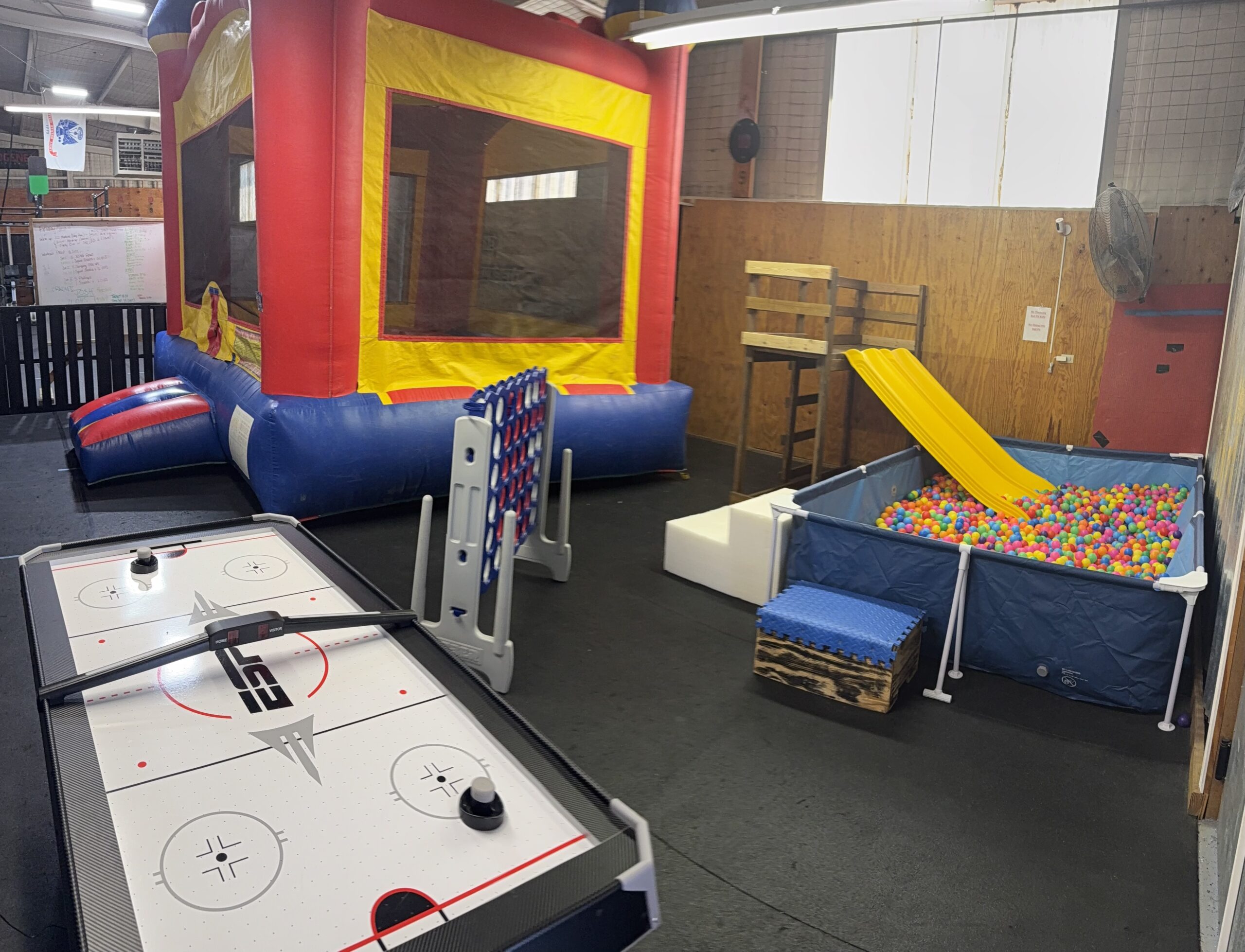 Bounce house and ball pit slide area at Garden City Fun Zone