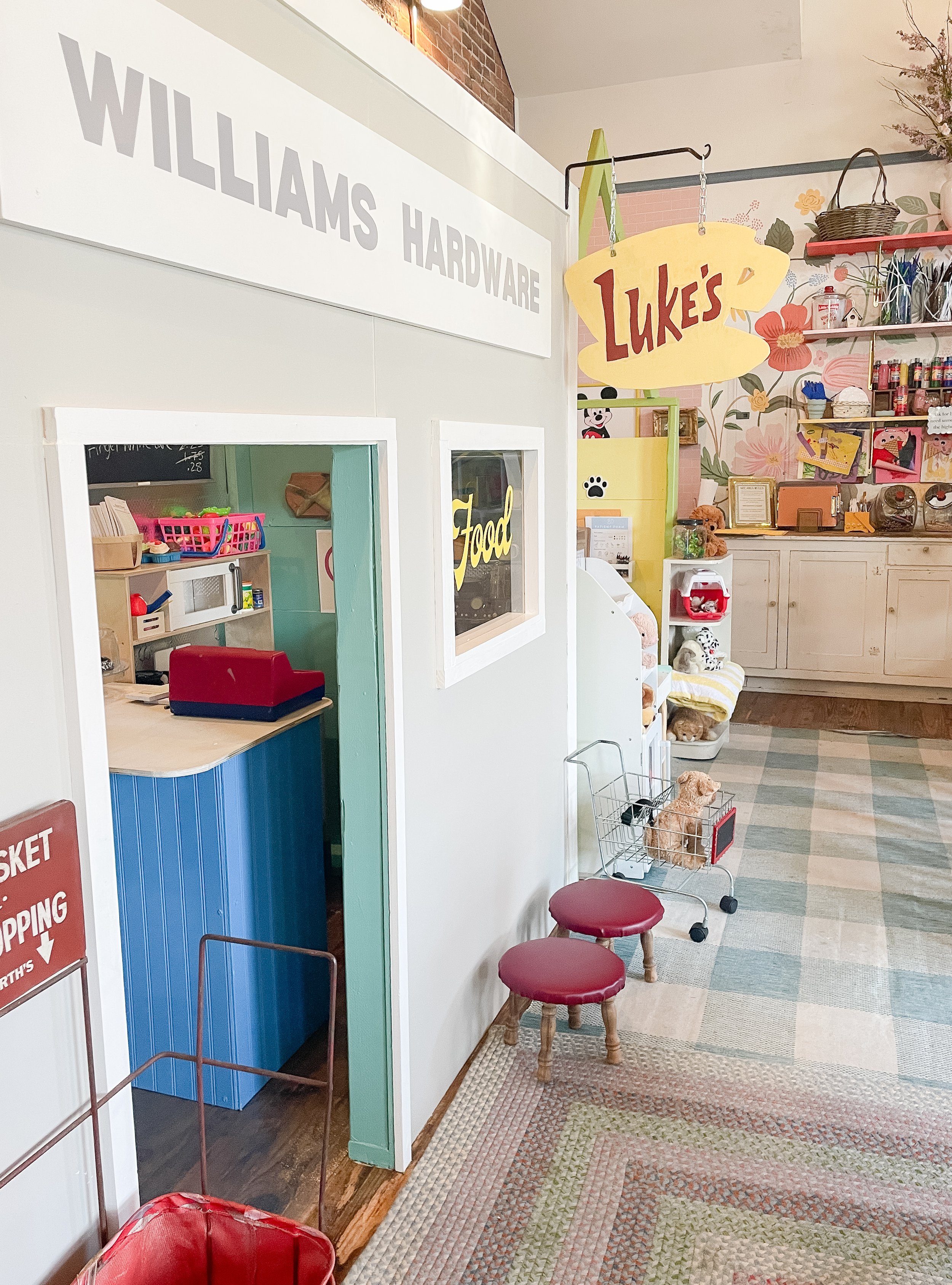 Pretend-play area at Gathered Play + Create.