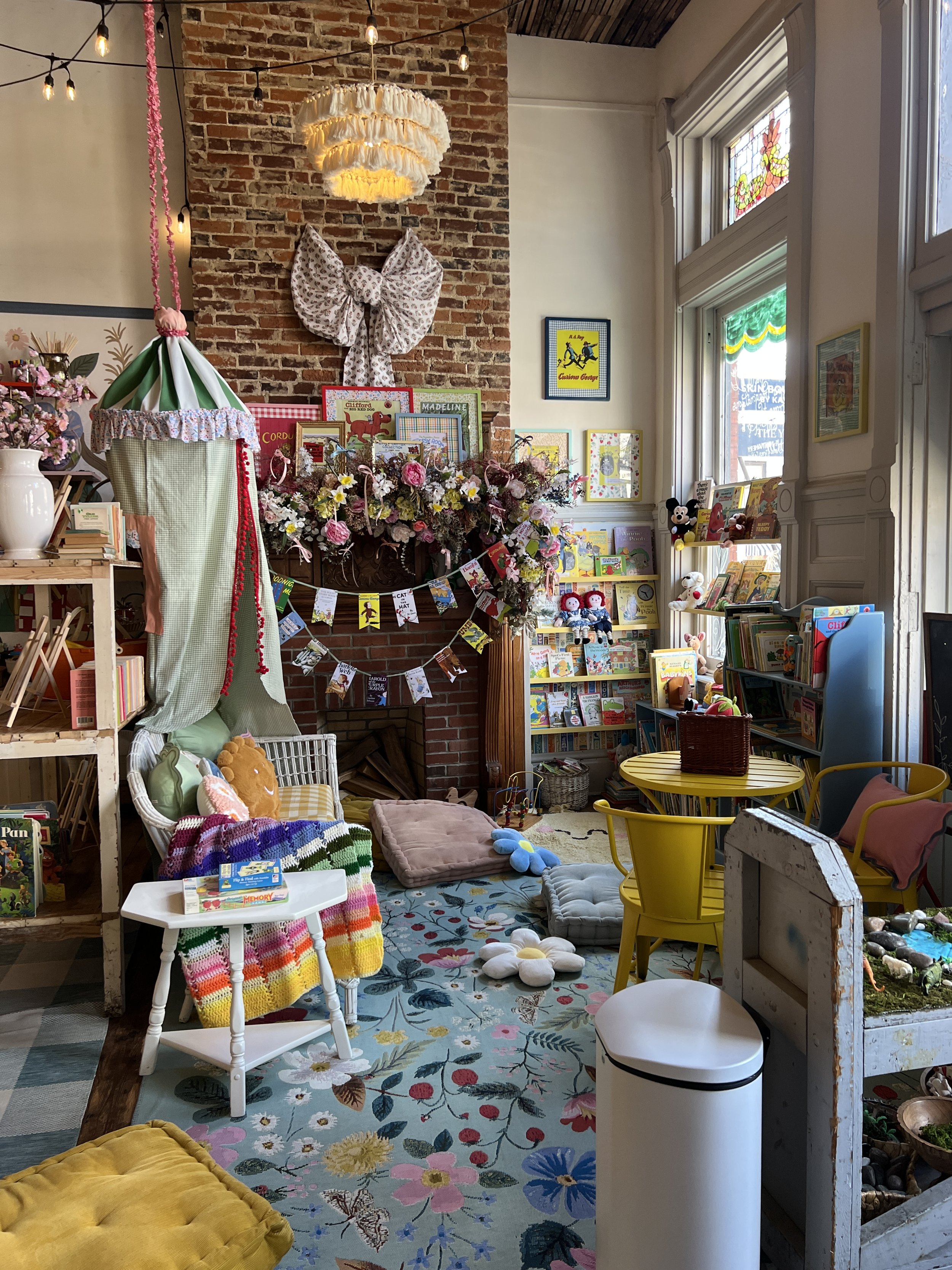 Indoor play and create station inside Gathered Play + Create.