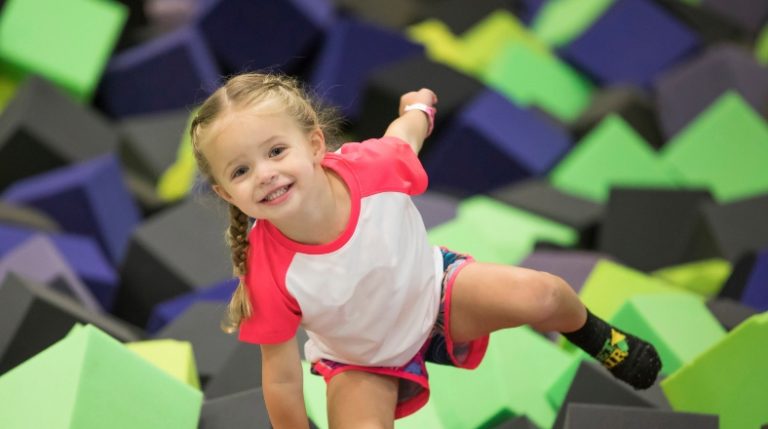 Young child in the foam pit at Get Air Waterloo.