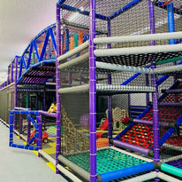 Climbing structure with nets and play obstacles at GG's Playland