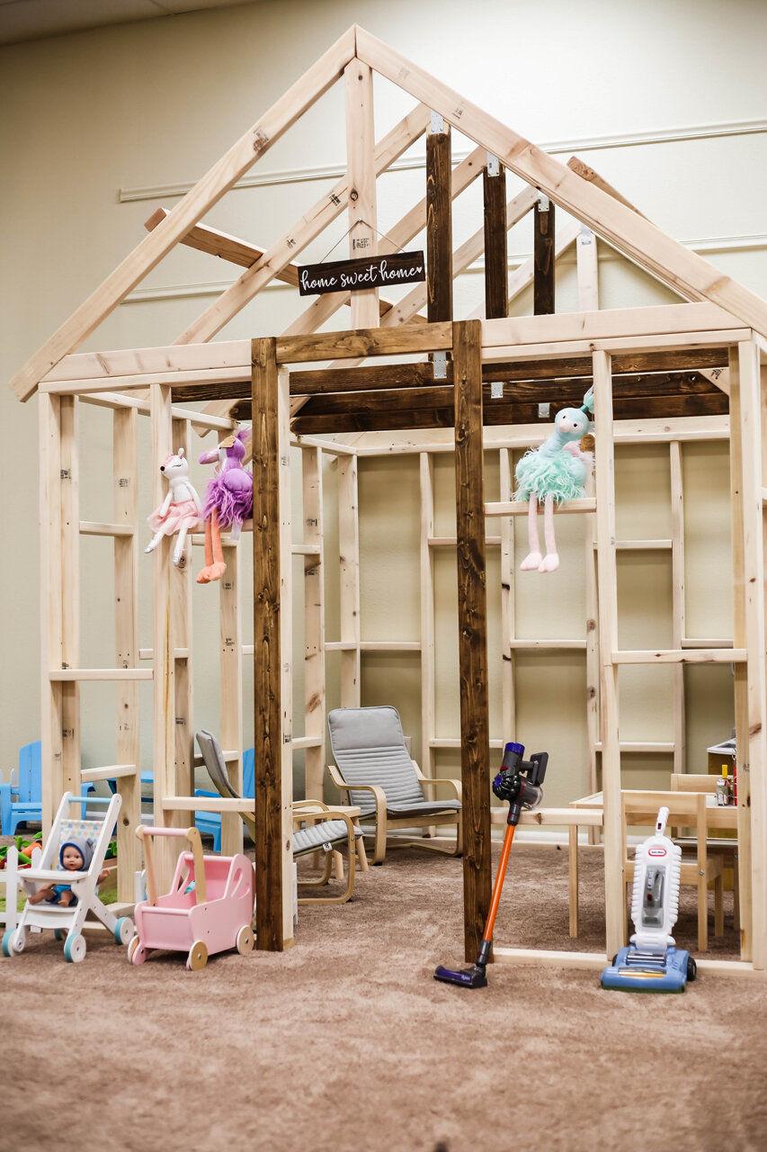 Pretend-play house area at Giggles Glendale