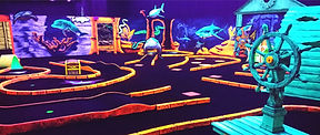 3D blacklight mini golf area at Hudson GNG.