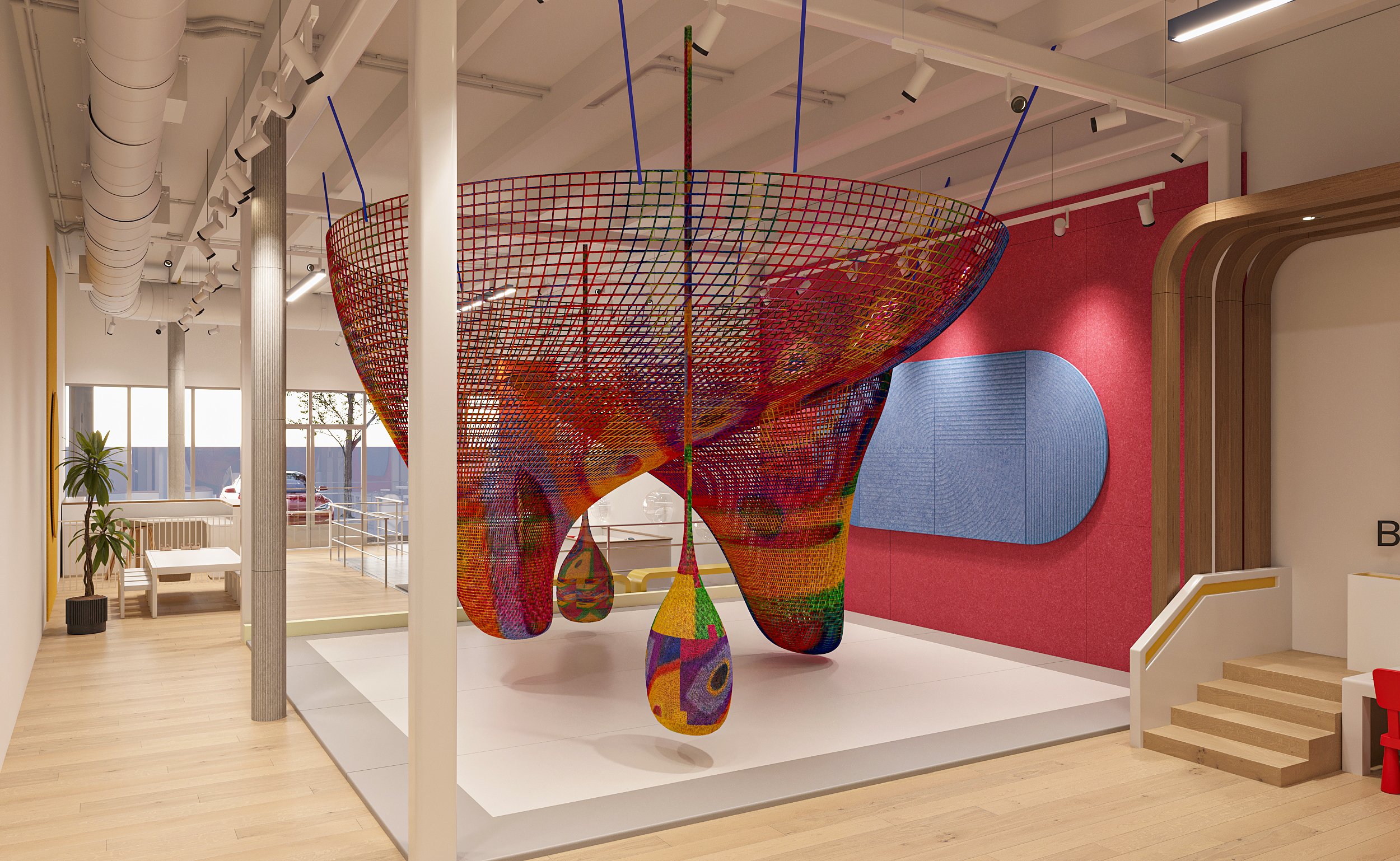 Suspended colorful climbing net at Imagine Minds.