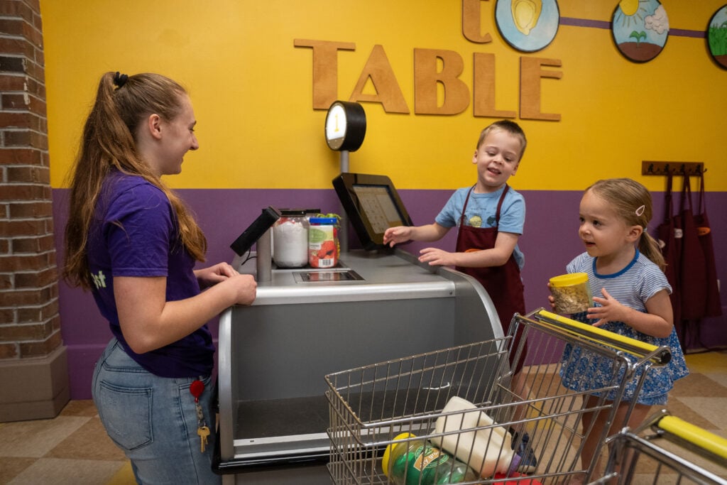 Pretend checkout play at The Iowa Children's Museum