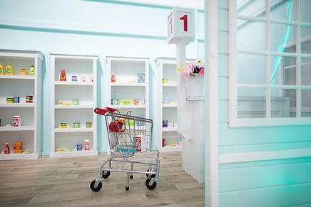 Pretend grocery play setup at It's Playtime.